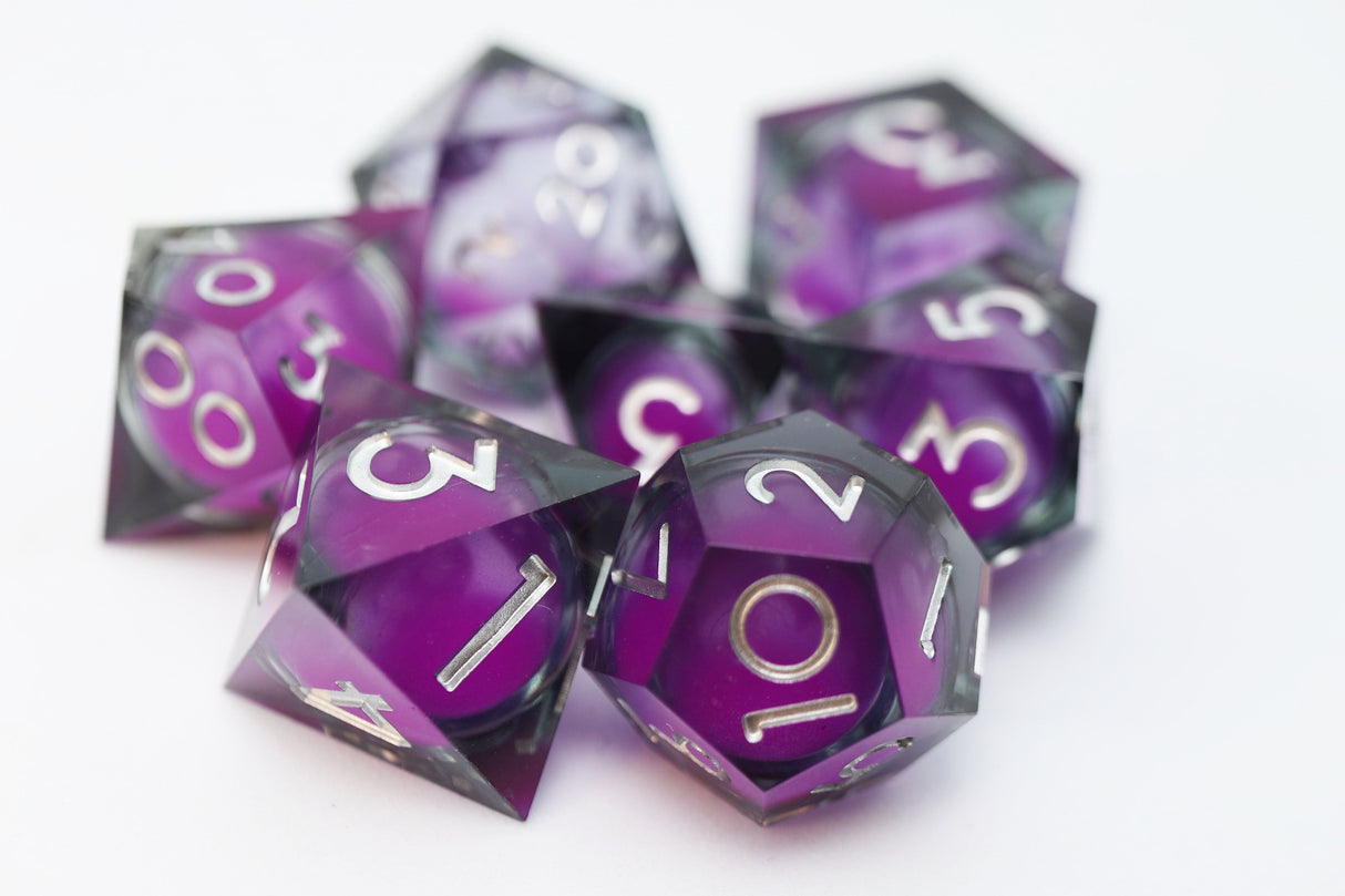 Sharp Edge Glow in the Dark Liquid Core RPG Dice Set - Violet Glimmer