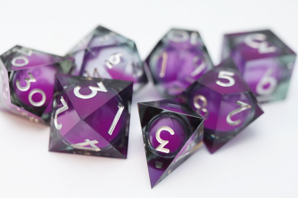 Sharp Edge Glow in the Dark Liquid Core RPG Dice Set - Violet Glimmer