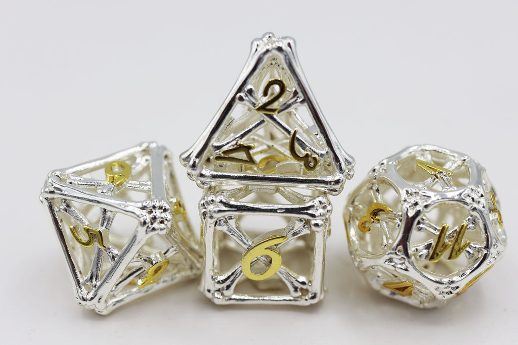 Holy Bones - Hollow Metal RPG Dice Set Metal Dice Foam Brain Games