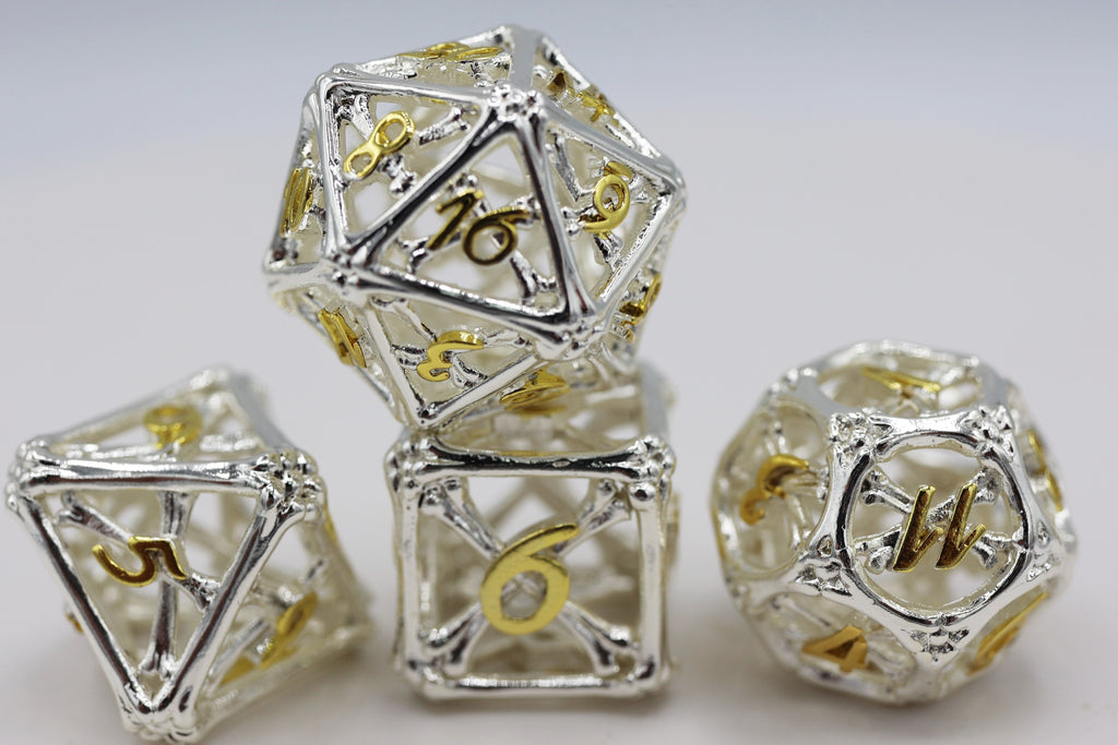 Holy Bones - Hollow Metal RPG Dice Set Metal Dice Foam Brain Games