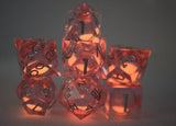 Sharp Edge Glow in the Dark Liquid Core RPG Dice Set - Radiant Pink Plastic Dice Foam Brain Games