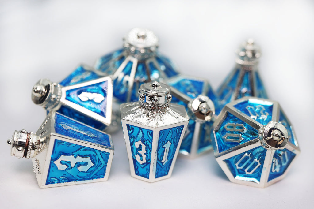 Moonlit Lantern: Silvered Frostfire - Metal RPG Dice Set Metal Dice Foam Brain Games