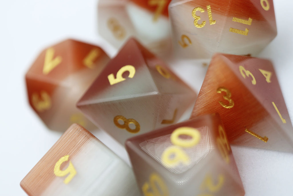 Orange and White Cat's Eye - Gemstone Engraved with Gold Stone Dice Foam Brain Games