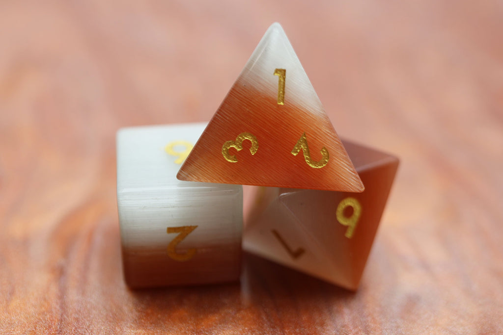 Orange and White Cat's Eye - Gemstone Engraved with Gold Stone Dice Foam Brain Games