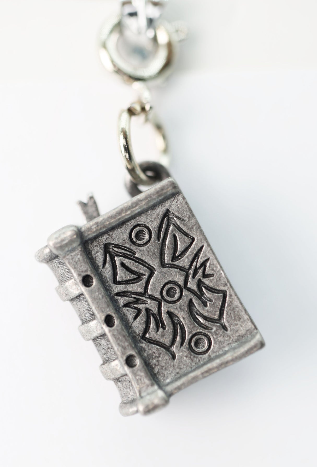 Traveler's Trinkets: Tome Charm Jewelry Foam Brain Games