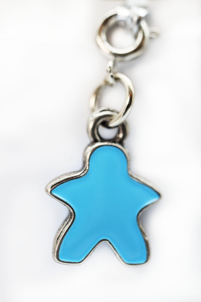 Traveler's Trinkets: Meeple - Blue Charm Jewelry Foam Brain Games