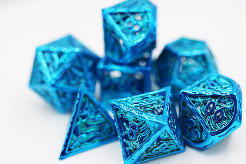 Seascape: Electro Blue - Hollow Metal RPG Dice Set Metal Dice Foam Brain Games