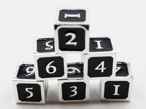 6 piece Metal D6s - Black and Silver Metal Dice Foam Brain Games