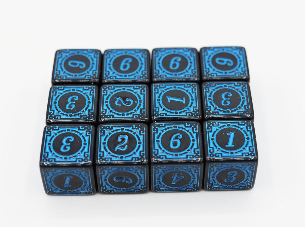 12 piece D6's - Magic Burst Blue Plastic Dice Foam Brain Games