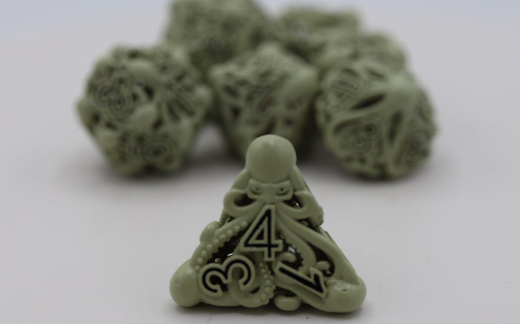 Mind Eater: Glow Green - Hollow Metal RPG Dice Set Metal Dice Foam Brain Games